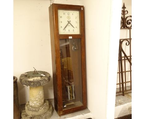 An early 20th century oak-cased National Time Recorder Company Ltd electric clock, W37cm, H131cm 