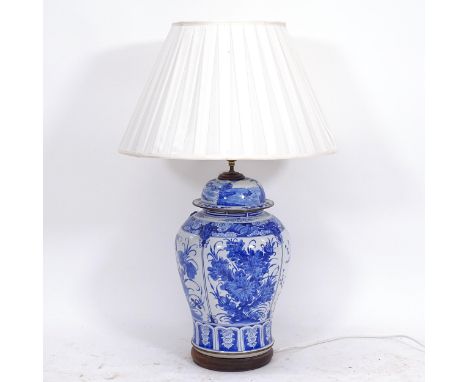 A Chinese blue and white porcelain table lamp on wooden base, height to top of jar 44cm 