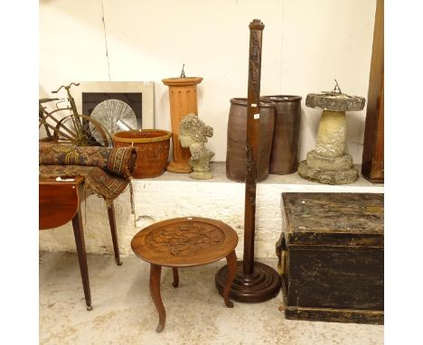 A Chinese design carved hardwood standard lamp, and a circular lamp table (2) 