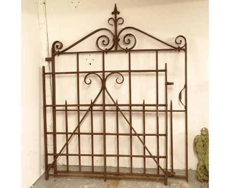 A scrolled wrought-iron side gate, width including hinge mount 115cm, H141cm, and a small wrought-iron gate, width including 