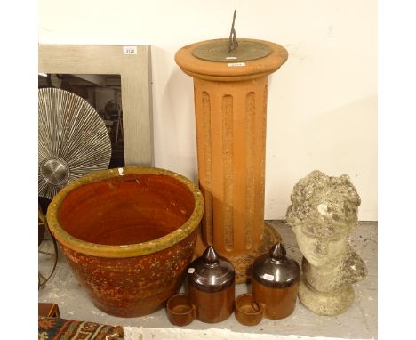 A pair of treacle glazed bird feeders, a terracotta sundial, H72cm, a weathered concrete bust, and a terracotta pot (5) 