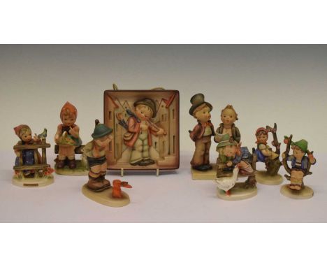 Seven Goebel Hummel figures and a wall plaque, 14cm high and smaller