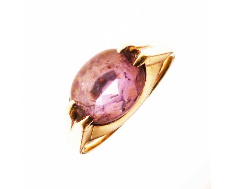 9ct gold ring set with an oval faceted 'purple' stone, size P½ approx, 4.2g gross approx