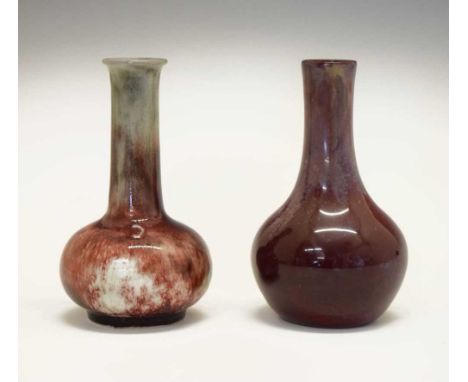 Bernard Moore – Vase of footed globe and shaft form with high-fired copper glaze in shades of ox-blood and purple on a pale b