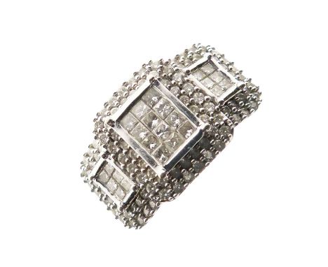 18ct white gold diamond dress ring, the three rectangular panels set with square cuts and round brilliant cuts, size O approx