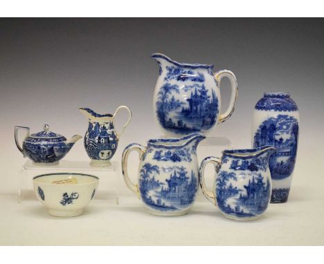 Seven pieces of blue and white wares to include; three Royal Doulton 'Madras' pattern jugs, Worcester bowl with floral decora