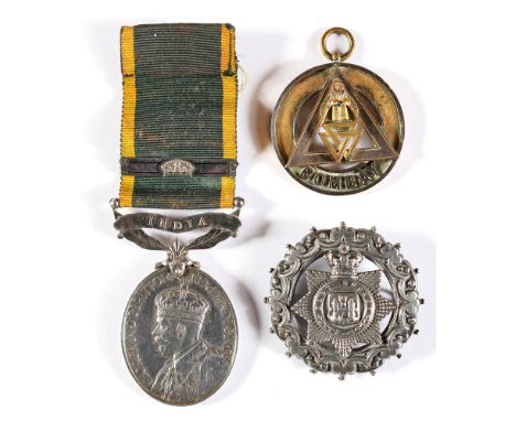 AN EFFICIENCY MEDAL TO PRIVATE L. BROWN, EAST INDIAN RAILWAY REGIMENT, AUXILIARY FORCE INDIA  George V with India scroll belo