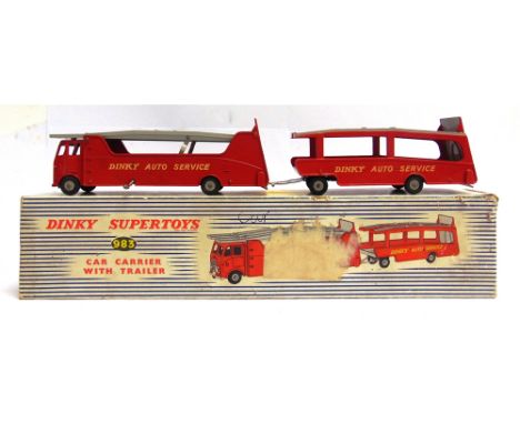 A DINKY NO.983, CAR CARRIER WITH TRAILER  red and grey with grey grooved hubs, generally very good condition, boxed, the box 