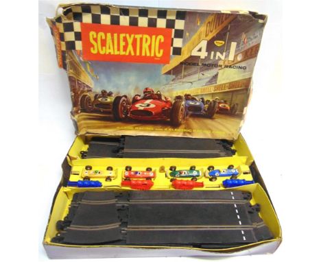 A SCALEXTRIC SET 80  comprising a C72, B.R.M., British Racing Green with a white nose, racing number 8; C72, B.R.M., blue wit