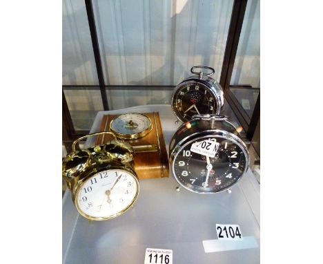 MIXED CLOCKS AND BAROMETER. Two stainless steel alarm clocks, barometer and brass alarm