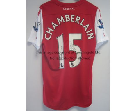 ALEX OXLADE-CHAMBERLAIN ARSENAL MATCH WORN SHIRT        A red shirt with white short sleeves worn in the Arsenal home match v