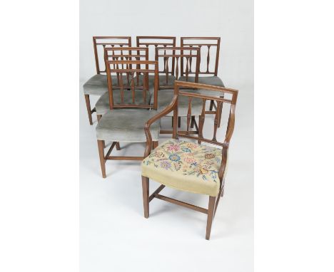 Set of seven mahogany dining chairs (6 + 1), 19th Century, with three acanthus carved and rosette stick backs, fabric upholst