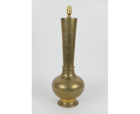 Indian chiselled brass lamp, baluster form worked with peacocks and scrolling foliage in Kashmiri style, height 58cm 