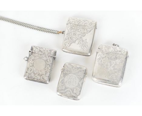 Four Victorian and later silver vesta cases, comprising an example engraved with vine leaves and with initialled cartouche, B