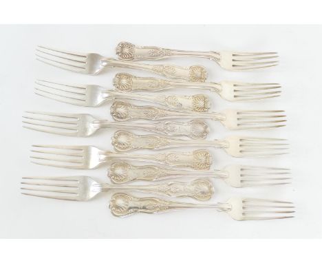 Eleven William IV and later silver Queens pattern dessert forks, each engraved with an arm and dagger crest and motto 'Vincer