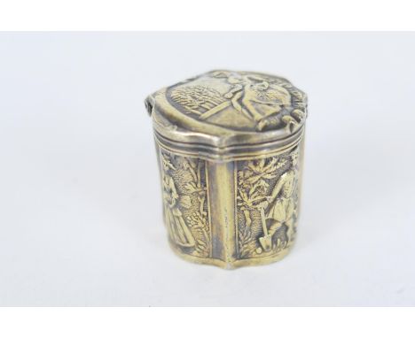 Dutch silver gilt pill box, 19th Century, traditional form repousse decorated with figural panels, 3cm 