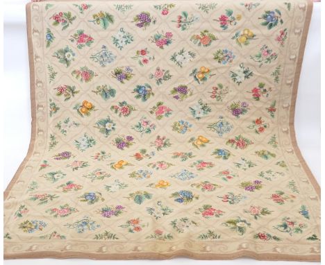 Gross-point woollen tapestry rug, modern, beige ground worked with fruits in a trellis, size approx. 254cm x 215cm 