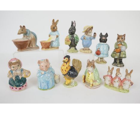 Eleven Beswick Beatrix Potter figures comprising: Anna Maria, gold oval mark (BP-2A); Pig-Wig, brown line back stamp (BP-3B),