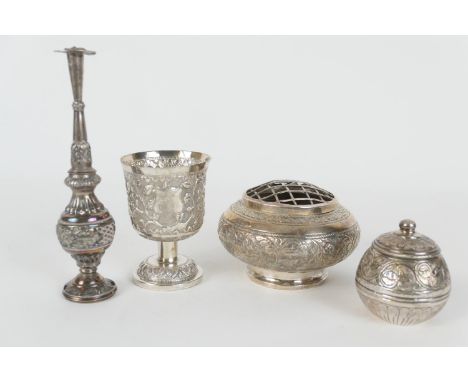 Middle Eastern white metal rosewater sprinkler, height 18cm; also a white metal goblet, chased with flowers; a Malaysian ster