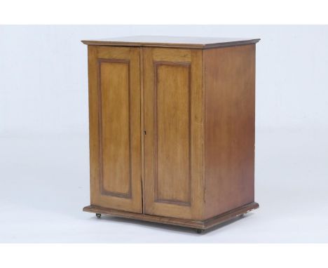 Edwardian mahogany cutlery chest, having two recessed panel doors opening to five graduating drawers with flush fitting handl