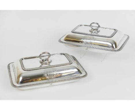 Pair of George III silver covered entree dishes, by T &amp; J Guest and Josh Craddock, London 1807, each of rectangular form 