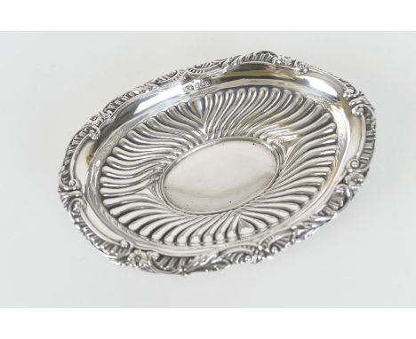 Late Victorian silver oval dish, Sheffield 1894, reeded and with everted C-scroll rim, 18cm, weight approx. 128g 