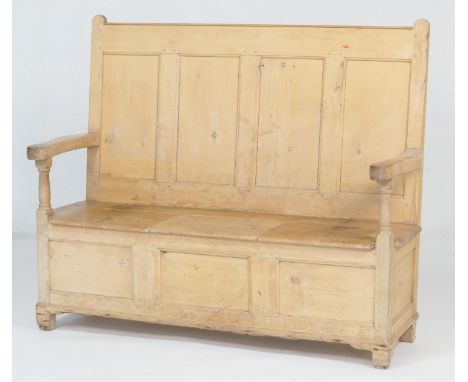 Victorian pine box settle, having a four recessed panel back, open arms, box seat with three recessed panel front, width 151c