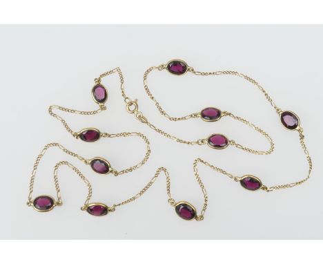 18ct gold figaro garnet necklace, with bolt ring clip, length 60cm, gross weight approx. 9.4g 