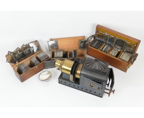 Magic lantern, together with a quantity of scenic slides contained within three wooden boxes, including South Africa, Scotlan