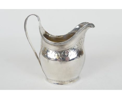 George III silver cream jug, London 1800, helmet shape with a vacant cartouche, height 11cm, weight approx. 96g 