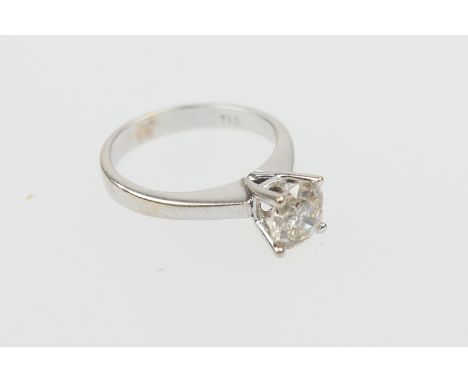 Diamond solitaire ring, the round brilliant cut stone of approx. 1ct, colour estimated as L/M, and clarity I1/2, in a four cl