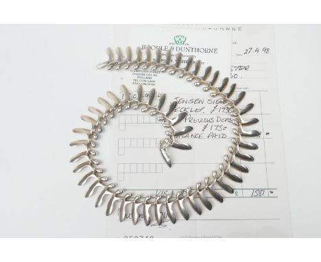 Georg Jensen silver necklace, designed by Bent Gabrielsen, pattern no. 115, London import marks for 1996, length 43cmNB: Boug