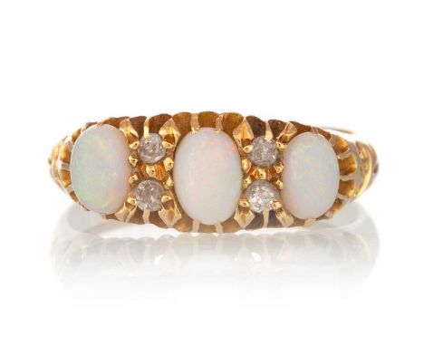 OPAL AND DIAMOND RING, in eighteen carat gold, size O 1/2Qty: 4.7g