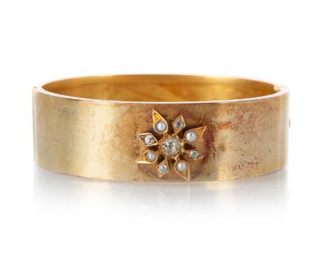 PEARL AND DIAMOND CUFF BANGLE, set with a central cluster of Old Mine cut diamonds and seed pearls, marked 15Qty: 22.6gVery w