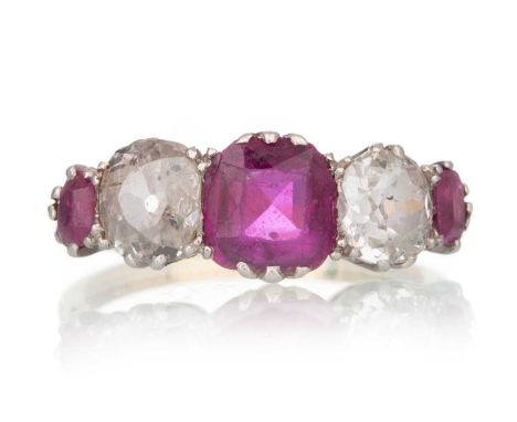 RUBY AND DIAMOND RING, set with cushion cut rubies and Old Mine Cut diamonds, the diamonds totalling very approximately 1.20 
