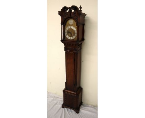 A 20th century miniature mahogany longcase clock, The hood with broken swan neck pediment and carved flowers and leaves and t