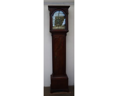 An 18th century mahogany Longcase clock, the hood with a moulded dentil cornice, blind fretwork panels and fluted ionic colum