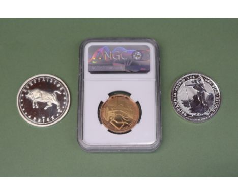 An H.G Wells first release PF70 Ultra cameo 2021 Gold £2 coin in an NGC plastic sleeve together with a 2017 Britannia 1oz .99