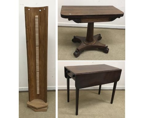 A Victorian rosewood card table, the fold-over top over a panelled and scrolling foliate carved frieze on a plain turned tape