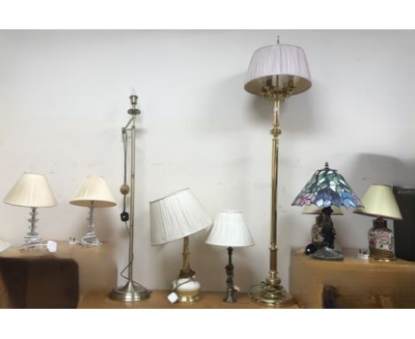 A modern brass four light standard lamp in the Victorian taste with pink fabric shade, 163 cm high, an anodised brass reading