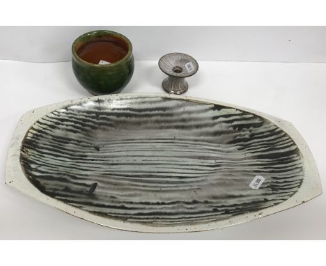 A David Leach black, white and pale turquoise ground striped dish of elliptical form, bearing seal mark to underside, 39.5 cm