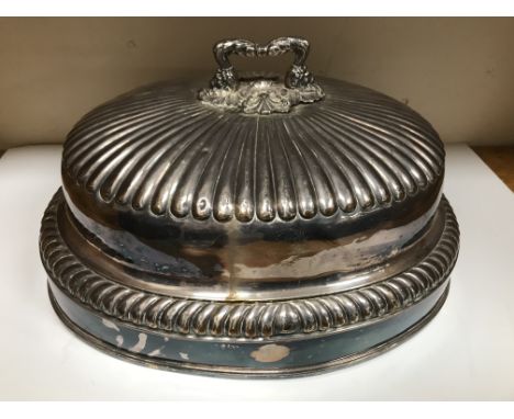 A Victorian plated food dome of reeded and gadrooned form bearing engraved inscription "13" with bugle within a wreath togeth