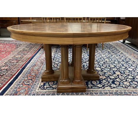 A Linley "Classic" dining table, the D end top with two extra leaves in burr walnut, cross-banded and satinwood strung, over 