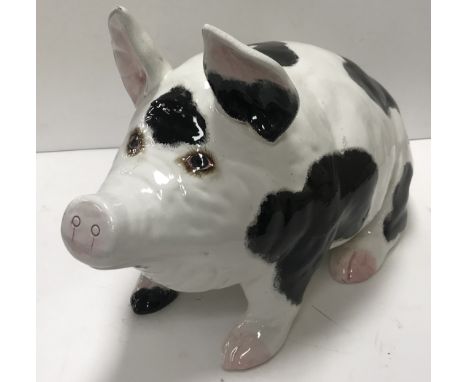 A large Wemyss black spotted pig with pink trotters and tail inscribed to base "Wemyss made in England" approx. 48 cm long x 