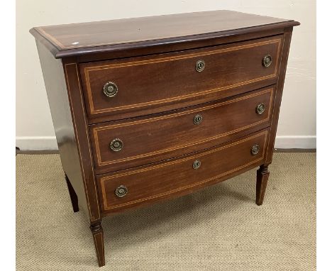 A 19th Century Portuguese mahogany and inlaid commode of bow fronted outline, the top with  moulded edge over three drawers w