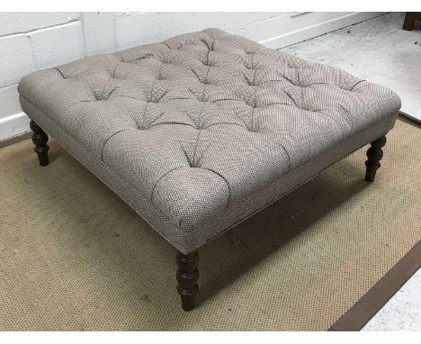 A modern buttoned upholstered drawing room stool in the Victorian manner, raised on bobbin turned supports (bought approx. 19