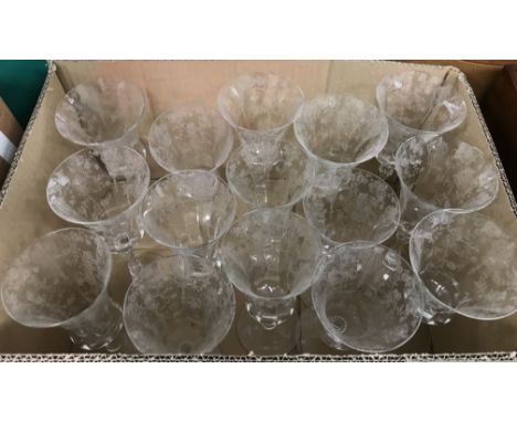 A collection of acid etched glassware by Fostoria circa 1930-40 including seven tall wines, eight short wines with trumpet sh