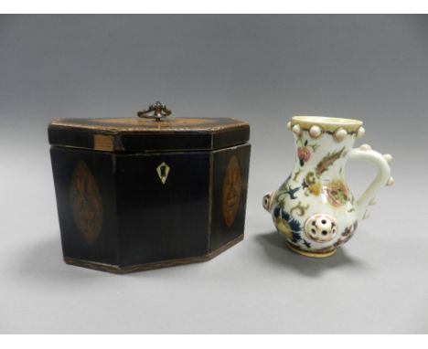 An inlaid mahogany hexagonal form tea caddy together with a Zsolnay pottery jug