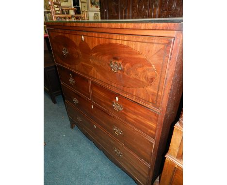 A Regency mahogany boxwood and ebony strung secretaire chest with fitted interior and drop down writing slope above two short