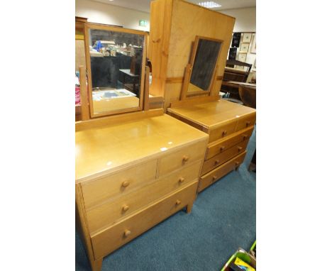 An early 1960s Staverton light oak dressing chest with two short drawers above two long drawers, 91cm wide, 50cm deep, 145cm 